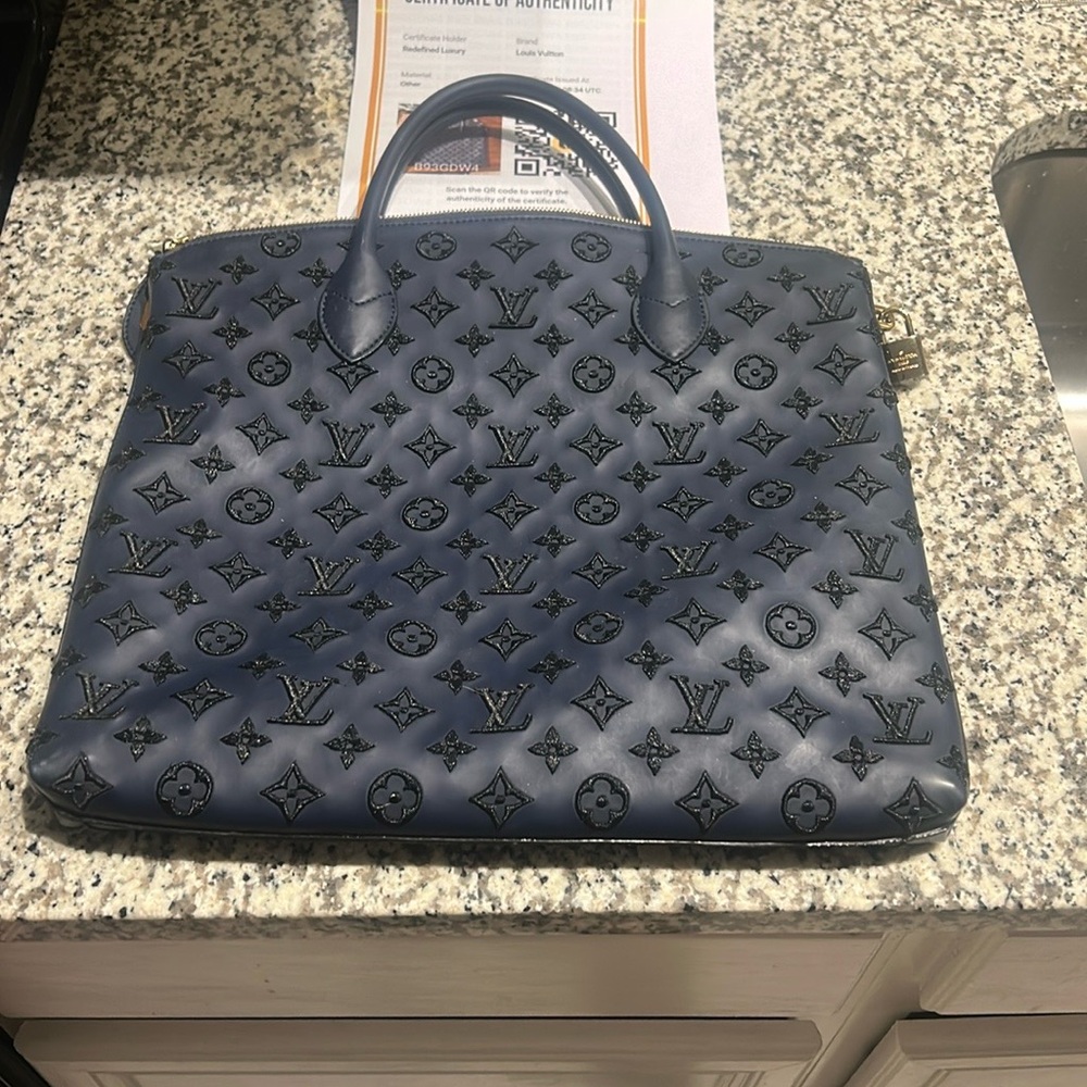 Louis Vuitton Navy Monogram Lockit Verticle W/ Certificate of Authenticity